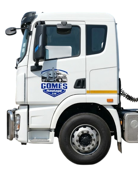 White Gomes Haulage truck cab with the company logo on its door